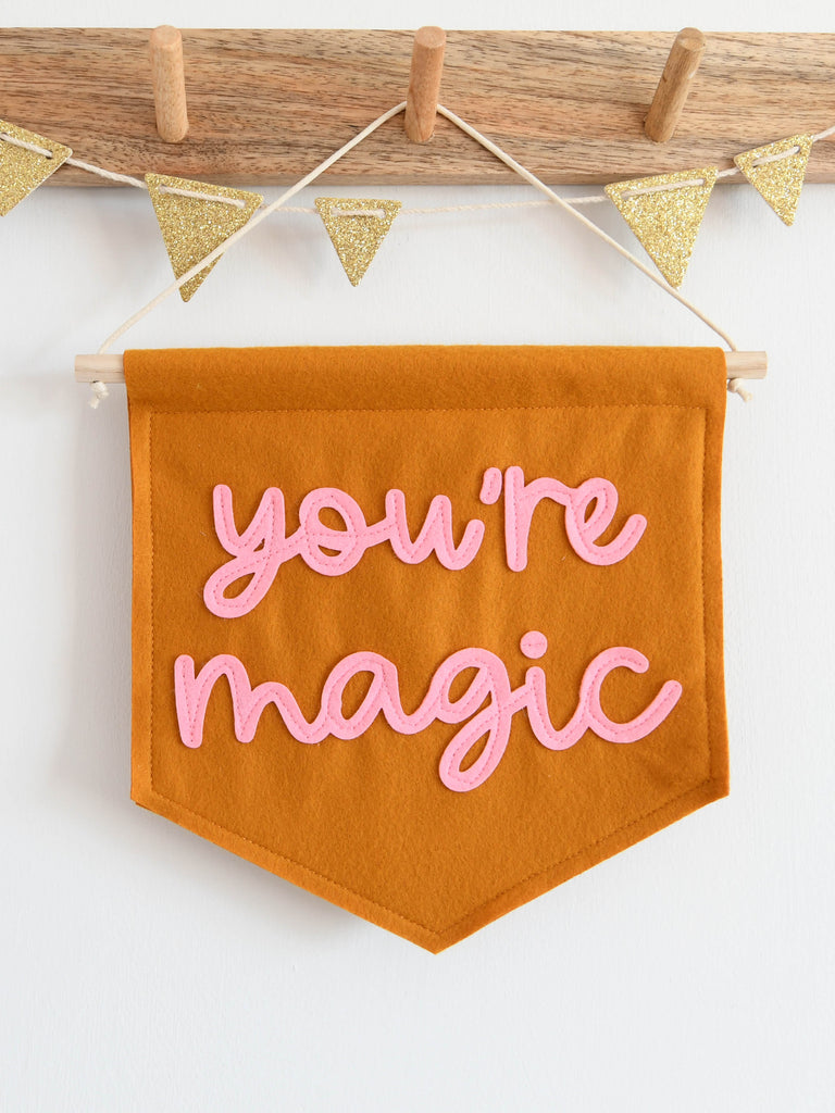 you're magic mini felt banner perfect for hanging from a hook or a shelf.